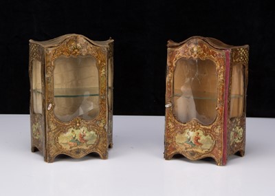 Lot 182 - A pair of French lithographed tinplate and wooden doll’s display cabinets