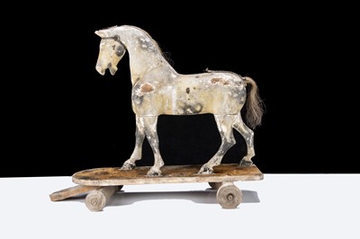 Lot 192 - A late 19th century English carved and painted wooden horse on wheels