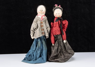 Lot 201 - An unusal late 19th century German pegged wooden type hand puppet couple