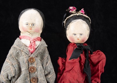 Lot 201 - An unusal late 19th century German pegged wooden type hand puppet couple