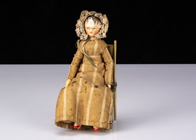 Lot 203 - A small early 19th century Grodnerthal carved wooden doll