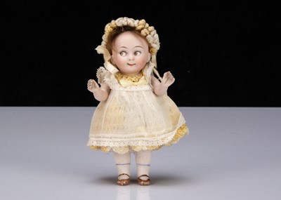 Lot 212 - A small German all-bisque googly eyed doll marked 292