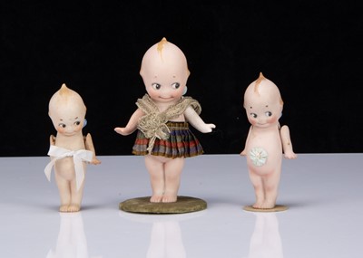 Lot 215 - Three Rose O’Neill all-bisque Kewpie