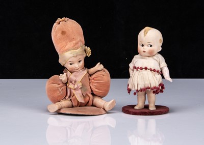 Lot 217 - Two small German all-bisque comic children dolls