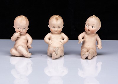 Lot 220 - Three seated Heubach comic bisque babies