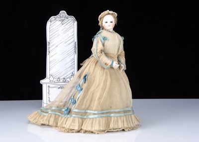 Lot 225 - A fine and rare French bisque swivel head fashionable doll with label for the Paris shop ‘A La Petite Amazone’