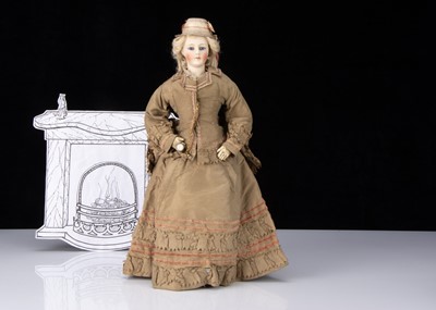 Lot 230 - An interesting German bisque shoulder head fashionable doll