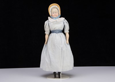 Lot 237 - An unusual German bisque shoulder-head doll would moulded bonnet