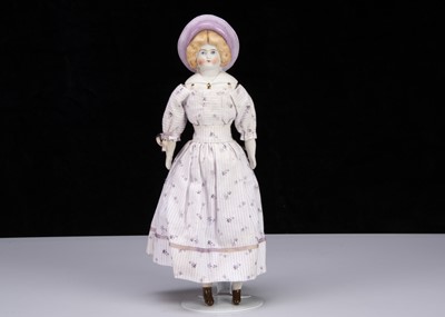 Lot 239 - A Hertwig bisque shoulder-head doll in moulded Sou’wester hat