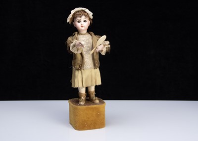 Lot 245 - A Lambert automaton of a girl powdering her nose