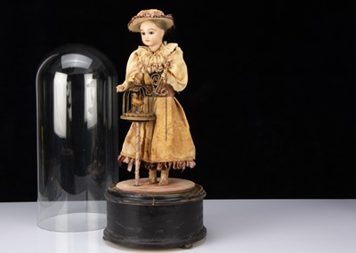 Lot 247 - A reproduction automaton of of a girl with birdcage