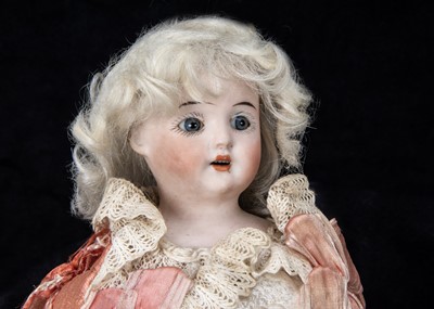 Lot 251 - A bisque headed musical marotte