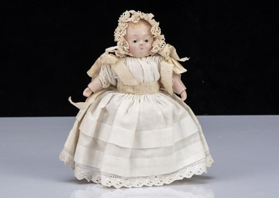 Lot 259 - A small mid 19th century papier-mâché Taufling baby