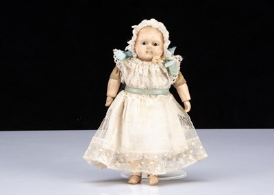 Lot 260 - A small mid 19th century papier-mâché Taufling baby