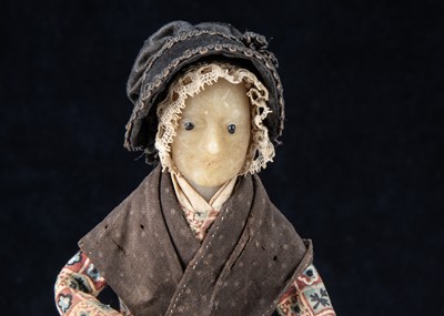 Lot 265 - A rare 19th century beeswax pedlar doll