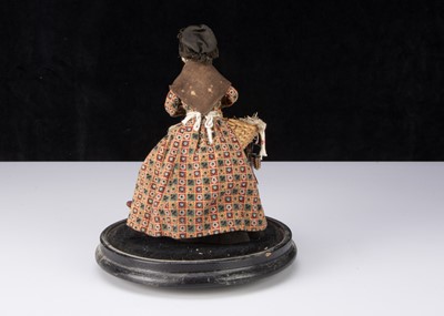 Lot 265 - A rare 19th century beeswax pedlar doll