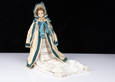 Lot 269 - An early 19th century English wax over papier-mâché doll