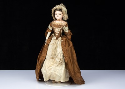 Lot 271 - An English early 19th century wax over papier-mâché doll in rare 18th century style silk open robe