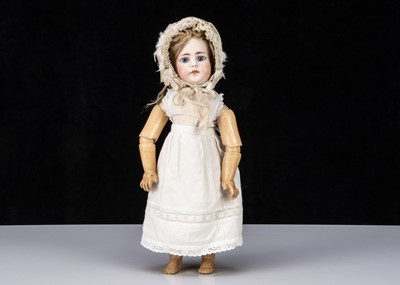 Lot 279 - A late 19th century German bisque headed doll impressed 51-7