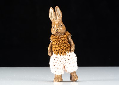 Lot 300 - A Hertwig all-bisque dolls’ house rabbit boy doll