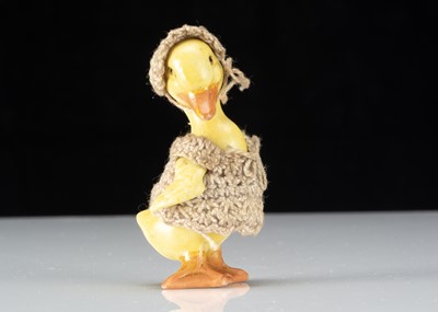 Lot 304 - A Hertwig all-bisque dolls’ house duckling girl doll