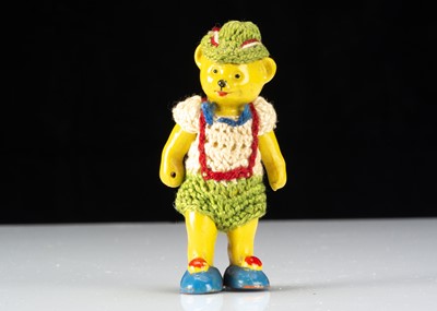 Lot 308 - An unusual Hertwig painted all-bisque dolls’ house teddy bear boy doll