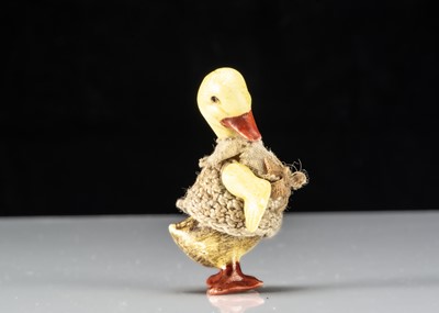 Lot 309 - A Hertwig all-bisque dolls’ house duckling boy doll