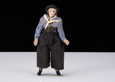 Lot 329 - An unusual late 19th century all-bisque sailor doll
