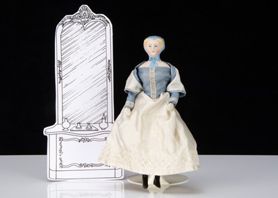 Lot 358 - An unusual small or dolls’ house bisque shoulder head doll with moulded cap