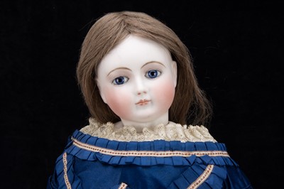 Lot 363 - A large late 19th century French pressed bisque swivel-head fashionable doll