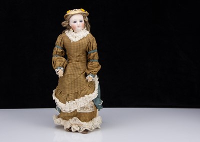 Lot 364 - A late late 19th century French pressed bisque swivel-head fashionable doll on Gesland body