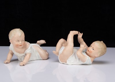 Lot 395 - Two Gebruder Heubach bisque Piano Babies