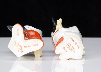 Lot 405 - A German porcelain Mickey & Minnie Mouse toothbrush holders 1930s
