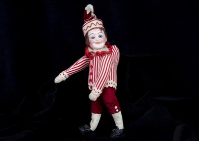 Lot 410 - An unusual French bisque headed Mr Punch or Pulcinella doll marked H