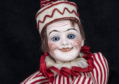 Lot 410 - An unusual French bisque headed Mr Punch or Pulcinella doll marked H