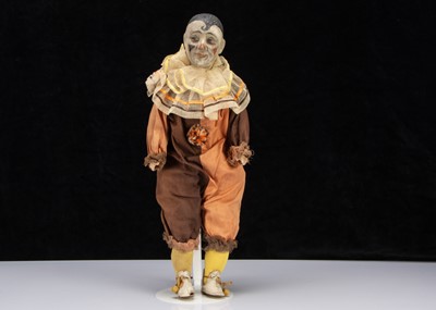 Lot 411 - An unusal German composition head clown with rocking head musical mechanism 1920s