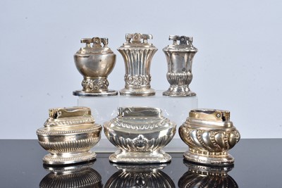 Lot 276 - A group of six Ronson silver plated table lighters