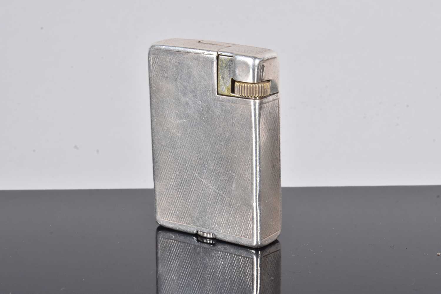 Lot 283 - A Silver Dunhill Pocket lighter