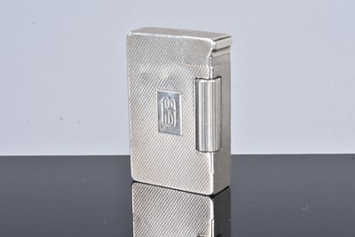 Lot 296 - A Bach & Cooper silver pocket lighter