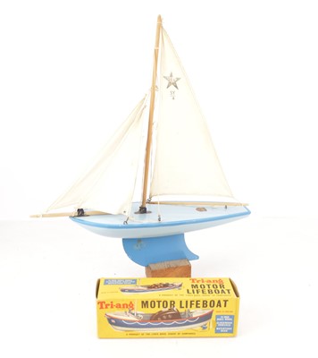 Lot 324 - Sailing yacht and Tri-ang Lifeboat (2)