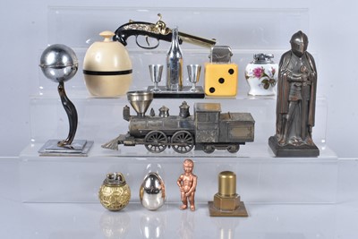 Lot 300 - A collection of Novelty table lighters