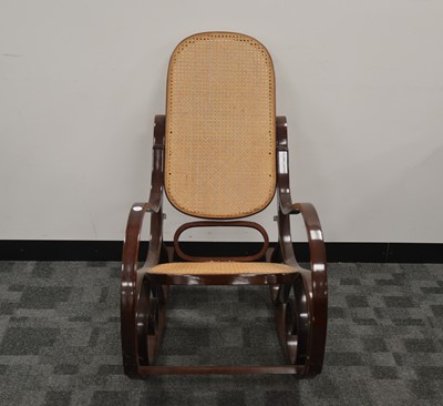 Lot 394 - A late 20th century bent wood rocking chair