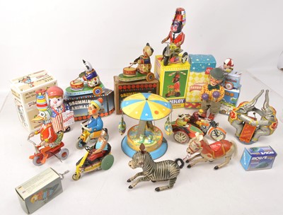 Lot 422 - Collection of vintage and modern boxed and unboxed clockwork Tin Toys including Animals  Circus and Bicycles (12)