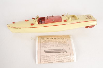 Lot 469 - A Hornby Meccano No 3 Racer 111, clockwork cream with red trim, Racing Boat