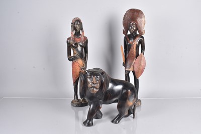 Lot 386 - Two carved African Hunting Figures