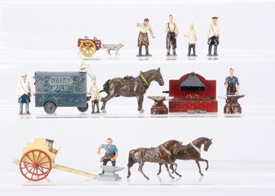 Lot 566 - Blacksmiths and milkmen by various makers including Britains and Moultoy comprising Charbens diecast electric milk cart (1 rear door missing) with milkman