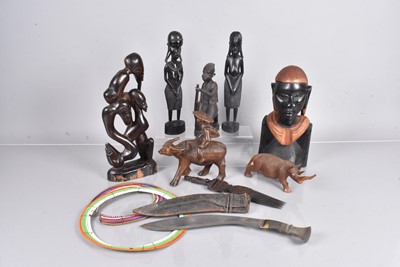 Lot 391 - An assortment of African figures