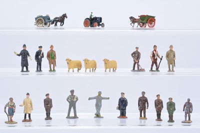 Lot 587 - A selection of sub-54mm scale figures by various makers including Britains and Taylor & Barrett comprising Timpo composition chauffeur in green