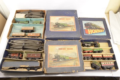 Lot 629 - Hornby 0 Gauge Clockwork Train Sets (3 boxes)