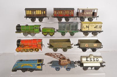 Lot 654 - Hornby and other makers 0 Gauge clockwork Locomotives and Passenger and Goods Rolling Stock